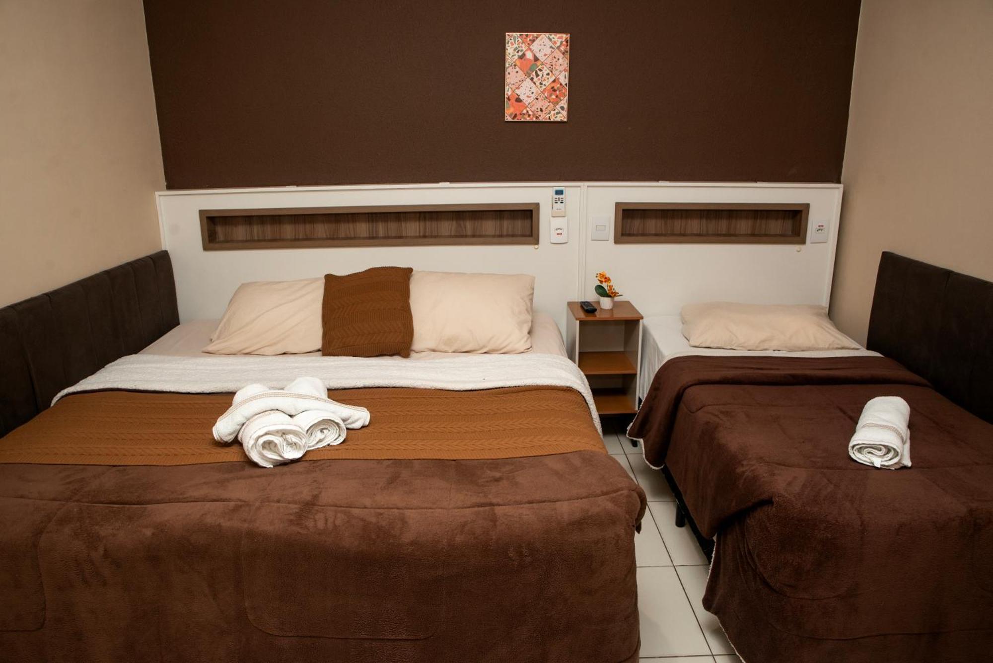 Quarto Triplo com Varanda